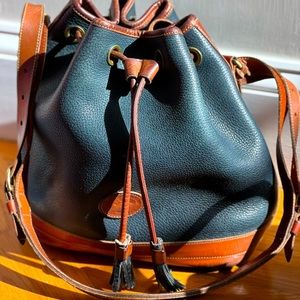Dooney & Bourke All Weather Leather Drawstring Bucket Bag with Shoulder Strap